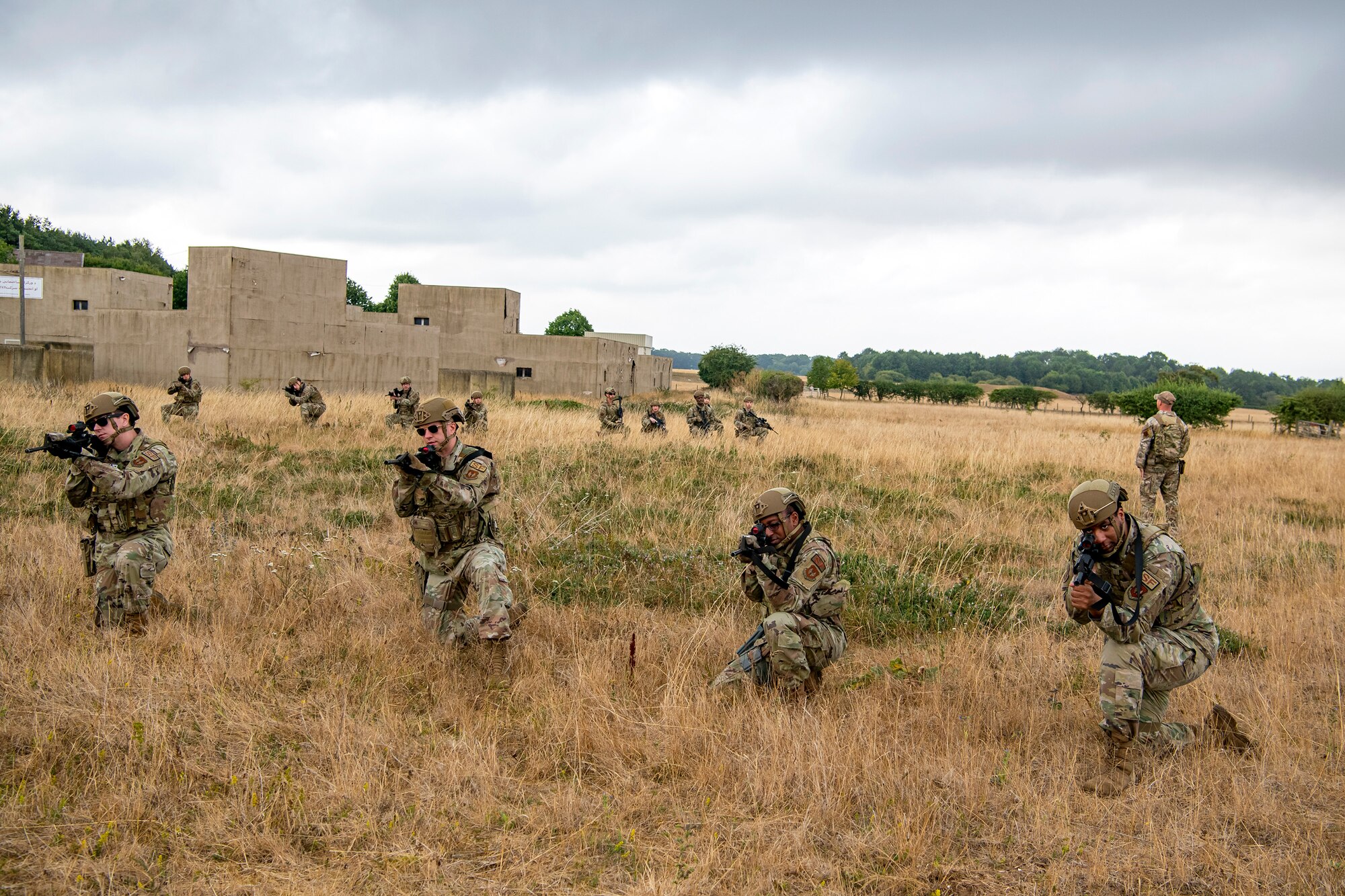 Airmen from the 423d Security Forces Squadron hold a formation during a field training exercise at Stanford Training Area, England, Aug. 17, 2022. Instructors from the 820th Base Defense Group and 435th Security Forces Squadron Ground Combat Readiness Training Center, conducted the exercise to evaluate and bolster the combat readiness skills of the defenders from the 423d SFS. (U.S. Air Force photo by Staff Sgt. Eugene Oliver)