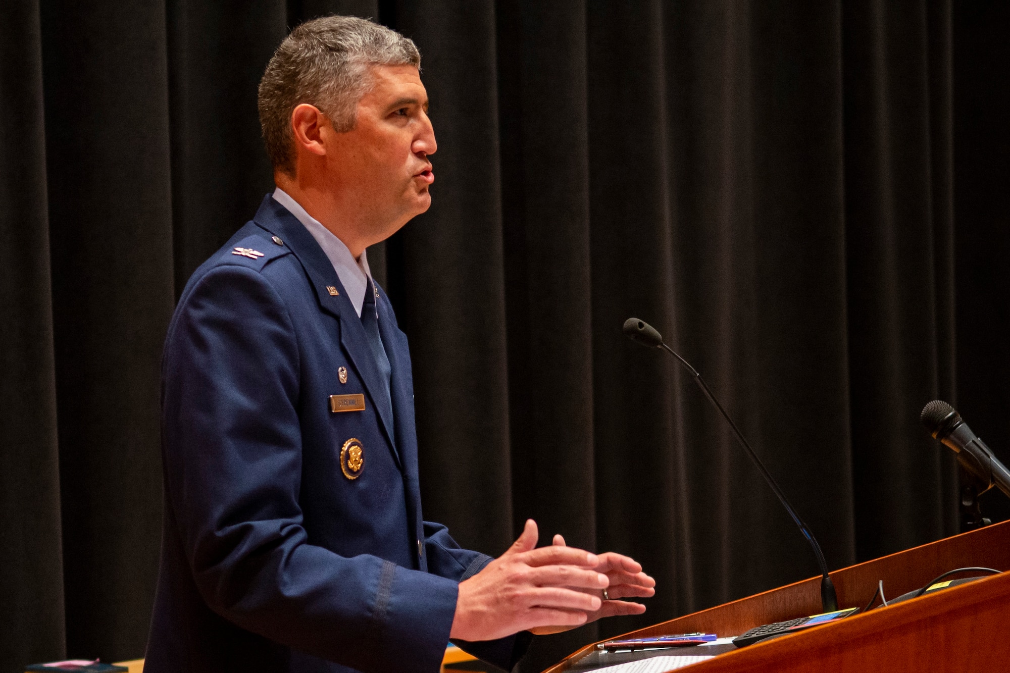Col. Kenneth Stremmel, Global Exploitation Intelligence Group commander, gives the opening remarks at the Signals Analysis Squadron change of command ceremony here, June 22, 2022. The squadron’s mission is to exploit signals to prevent surprise, enable military operations, and protect national security. During the ceremony, Lt. Col. Axel A. Gonzalez took command from Lt. Col. Travis Kornahrens. (U.S. Air Force photo by Staff Sgt. Samuel Earick)