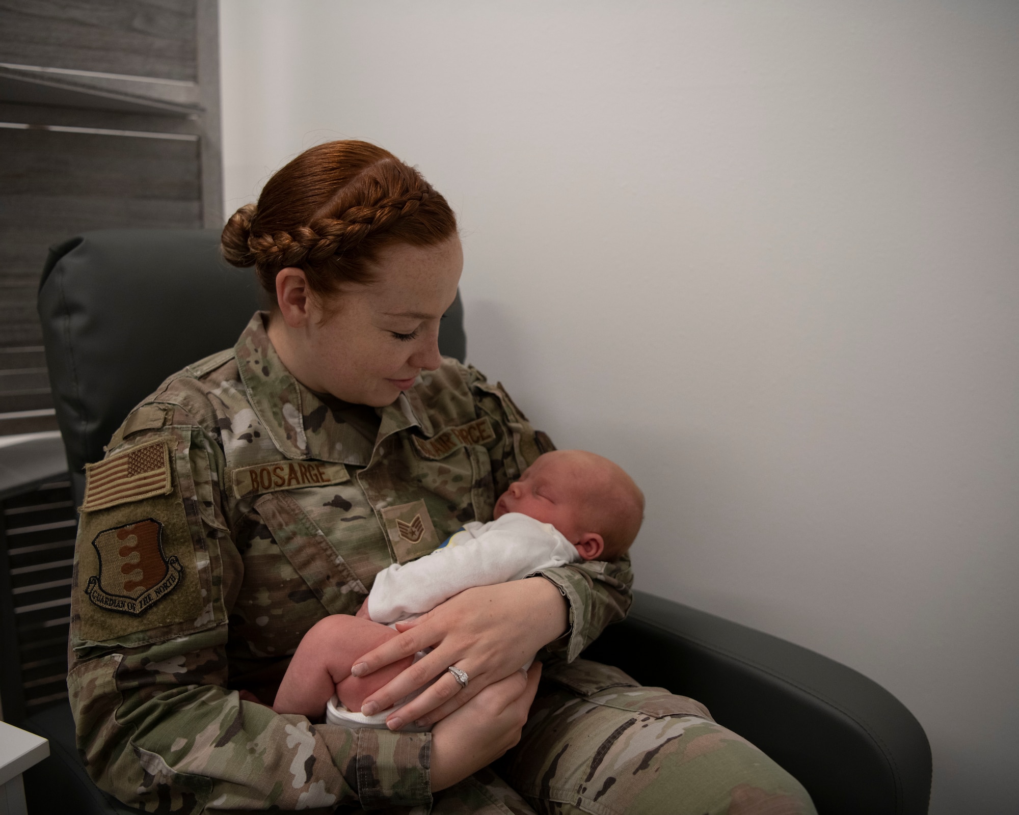 Staff Sgt. Alexi Bosarge, the noncommissioned officer in charge of community engagement, utilizes the lactation room located within the 28th Bomb Wing Headquarters at Ellsworth Air Force Base, S.D., July 6, 2022.