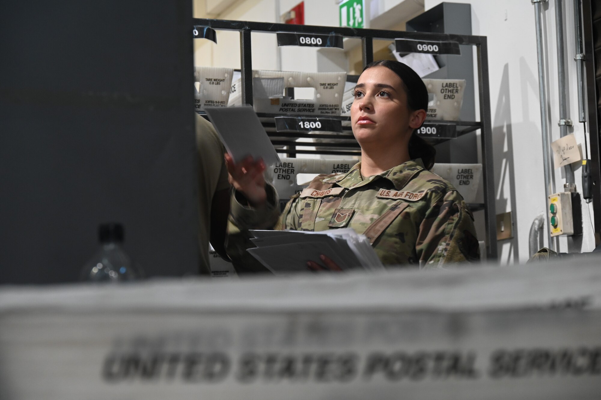 U.S. Air Force Tech. Sgt. Orlany Chaves, a human resource specialist assigned to the 175th Force Support Squadron, Maryland Air National Guard, sorts mail during annual training, July 18, 2022, at Aviano Air Base, Italy.