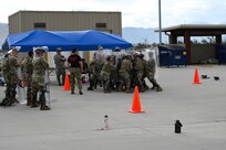 Soldiers from the 142nd Military Intelligence Battalion practice crowd control tactics during an evaluation exercise