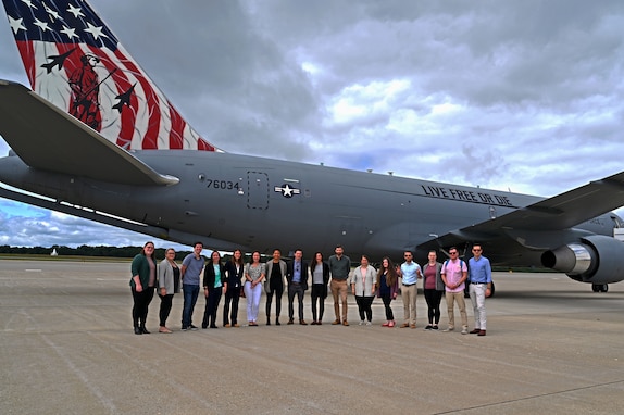 State congressional staffers gather in front of the Spirit of Portsmouth, KC-46A Pegasus on Aug. 23, 2022, at Pease Air National Guard Base in Newington, N.H.