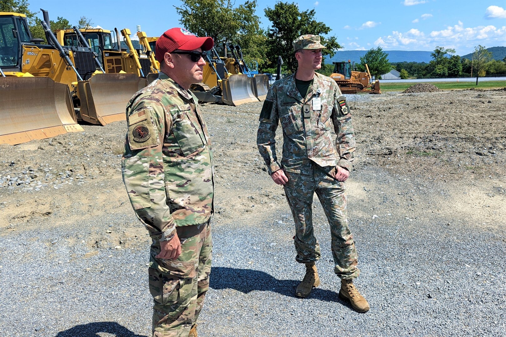 Maj. Mantas Kazakevičius, right, Lithuanian Armed Forces liaison officer to the Pennsylvania National Guard, met with Pennsylvania Air National Guard engineers and senior leaders Aug. 24, 2022, at Fort Indiantown Gap, Pa. The Pennsylvania Guard and Lithuania have been partners under the Department of Defense National Guard Bureau State Partnership Program since 1993.