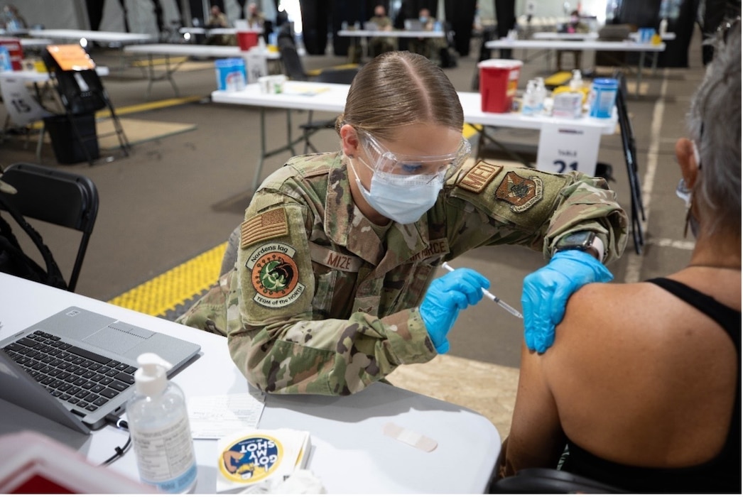 25 McConnell Medics augmented a St. Paul, Minnesota vaccine site in spring of 2021 to support FEMA & curb COVID-19 cases.