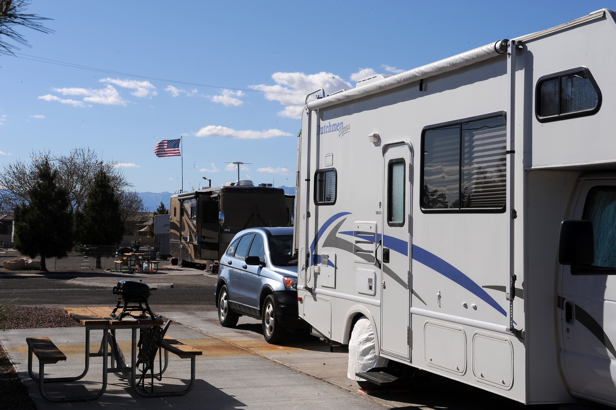 Recreational vehicles, like the one shown here, must be registered with Outdoor Recreation and parked in the Hanscom RV lot, located in the civil engineering compound, adjacent to building 1811 on Grenier Street. RVs can be parked for up to 24 hours in base housing, or in a temporary or marked space for short-term cleaning or repairs. (U.S. Air Force photo by Senior Airman Jack Sanders)