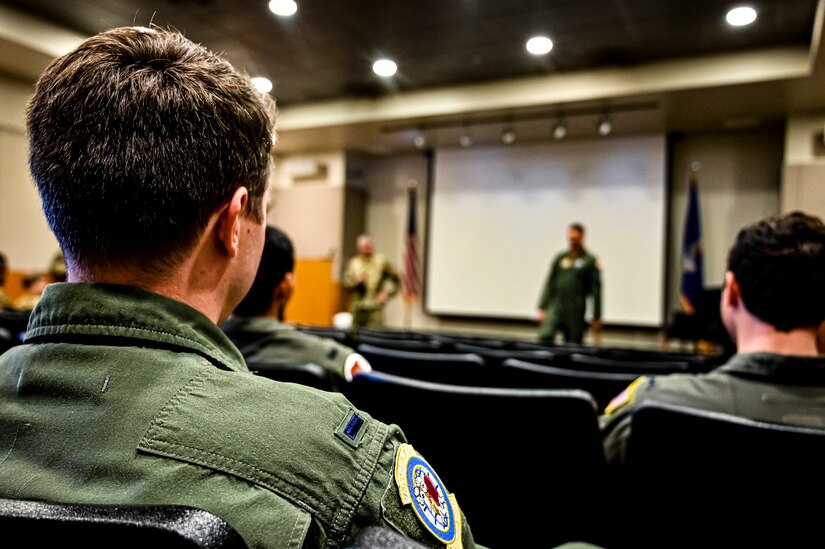 U.S. Air Force Maj. Gen. Albert Miller, Aircrew Task Force director, addresses pilots assigned to the 305th Air Mobility Wing at Joint Base McGuire-Dix-Lakehurst, N.J. on Aug. 25, 2022. Miller has amplified community outreach to aircrew members in the field through increased site visits. These visits provide a chance to have meaningful discussions with all aircrew members to capture operational, quality of life, and quality of service concerns to inform policy decisions.