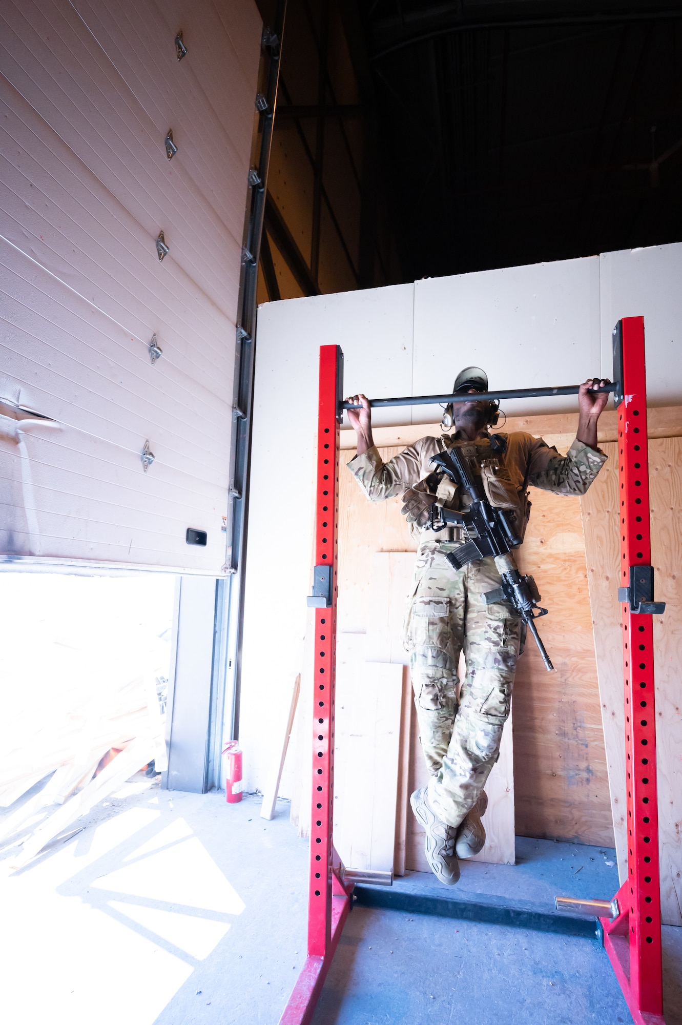 Staff Sgt. Nasir Holliday, 341st Missile Security Operations Squadron tactical response force defender, completes a pull-up during training Aug. 18, 2022, at Malmstrom Air Force Base, Mont.