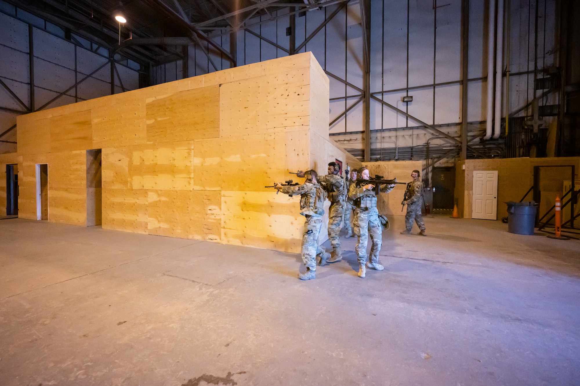 Members of the 341st Missile Security Operations Squadron tactical response force practice clearing a building during training Aug. 18, 2022, at Malmstrom Air Force Base, Mont.