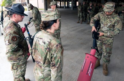 Basic military trainees learn weapons operations