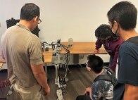This spring, senior students from the University of Hawaii (UH) College of Engineering, presented a design of an underwater robotic arm as part of a Senior Design/Capstone Project at Pearl Harbor Naval Shipyard and Intermediate Maintenance Facility (PHNSY & IMF). The students presented their project to school staff, faculty and project supervisors from PHNSY & IMF.  The shipyard and the University of Hawaii System maintain an educational partnership in which programs are developed so that students in science, technology, engineering and mathematics may earn academic credit for work on PHNSY & IMF projects to include research and technology. Under this partnership, UH System faculty, staff and students can use PHNSY & IMF engineering assets and resources.  (Official U.S. Navy photo William Anderson)