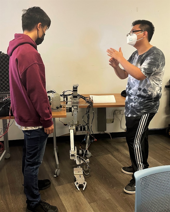 This spring, senior students from the University of Hawaii (UH) College of Engineering, presented a design of an underwater robotic arm as part of a Senior Design/Capstone Project at Pearl Harbor Naval Shipyard and Intermediate Maintenance Facility (PHNSY & IMF). The students presented their project to school staff, faculty and project supervisors from PHNSY & IMF.  The shipyard and the University of Hawaii System maintain an educational partnership in which programs are developed so that students in science, technology, engineering and mathematics may earn academic credit for work on PHNSY & IMF projects to include research and technology. Under this partnership, UH System faculty, staff and students can use PHNSY & IMF engineering assets and resources.  (Official U.S. Navy photo William Anderson)