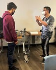 This spring, senior students from the University of Hawaii (UH) College of Engineering, presented a design of an underwater robotic arm as part of a Senior Design/Capstone Project at Pearl Harbor Naval Shipyard and Intermediate Maintenance Facility (PHNSY & IMF). The students presented their project to school staff, faculty and project supervisors from PHNSY & IMF.  The shipyard and the University of Hawaii System maintain an educational partnership in which programs are developed so that students in science, technology, engineering and mathematics may earn academic credit for work on PHNSY & IMF projects to include research and technology. Under this partnership, UH System faculty, staff and students can use PHNSY & IMF engineering assets and resources.  (Official U.S. Navy photo William Anderson)