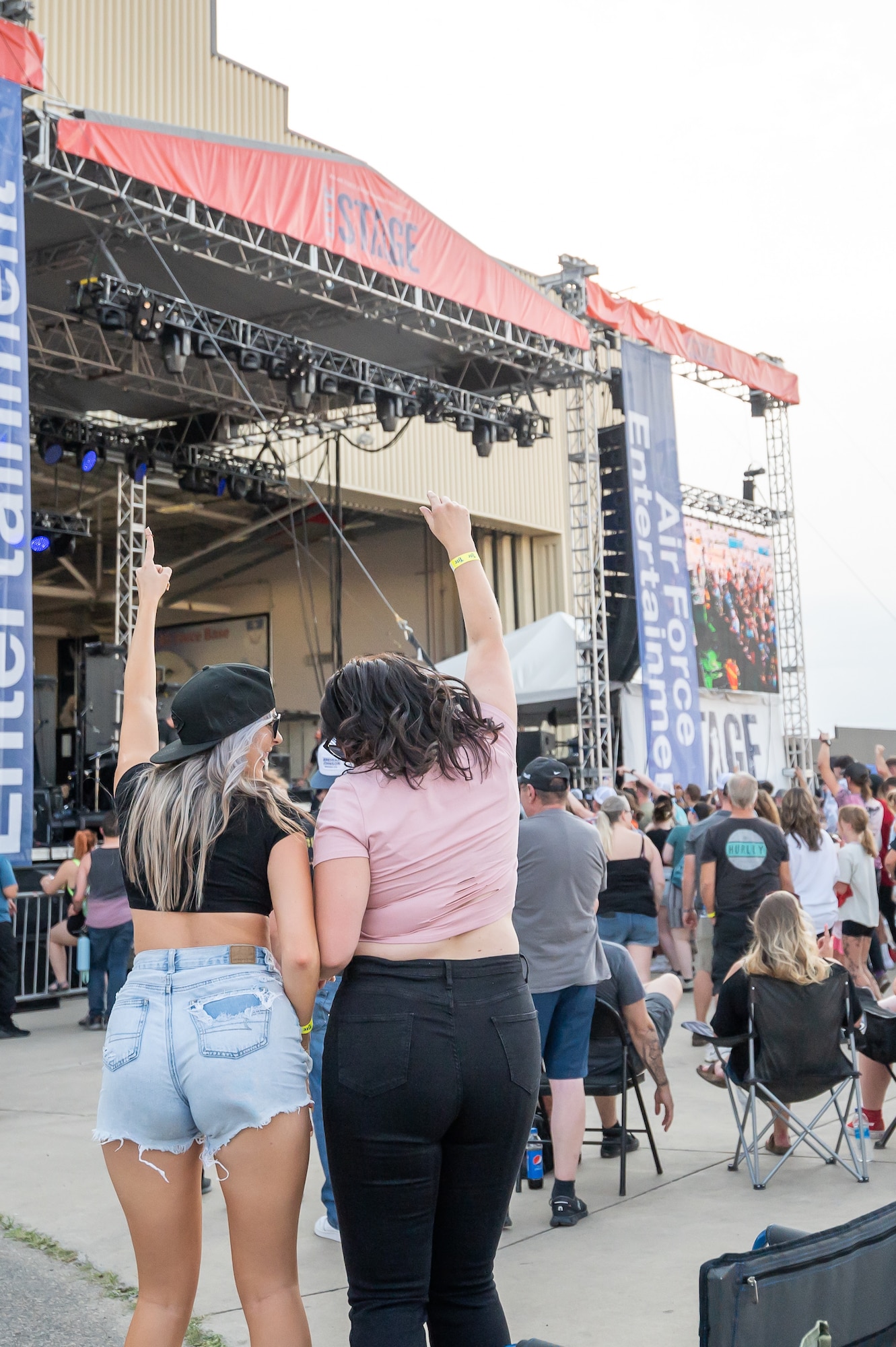 Audience members dance to a song played by the rock band We the Kings during Rock Fest Aug. 20, 2022, at Malmstrom Air Force Base, Mont.