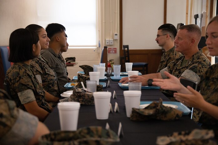 U.S. Marine Corps Maj. Gen. David W. Maxwell, commander, Marine Corps Installations Command speaks with Marines during a breakfast at Anderson Chow Hall, Marine Corps Base Hawaii, Aug. 23, 2022. Maxwell visited and toured the installation to observe the daily operations of the base personnel and its facilities. (U.S. Marine Corps photo by Cpl. Brandon Aultman)