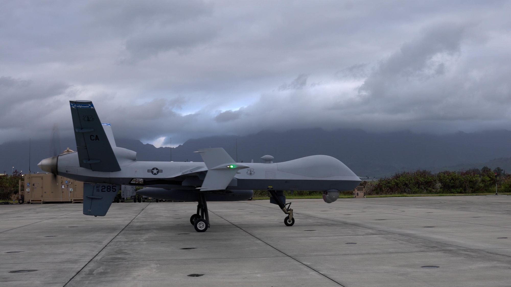 An MQ-9A Reaper sits on a runway during Rim of the Pacific (RIMPAC) 2022 at Marine Corps Air Base Hawaii, Hawaii , July 21, 2022. The remotely piloted aircraft, assigned to the 163rd Attack Wing, responded to the scene of a ship fire during a training exercise in the world's largest international maritime exercise. (U.S. Air Force photo by Airman 1st Class Ariel O'Shea)