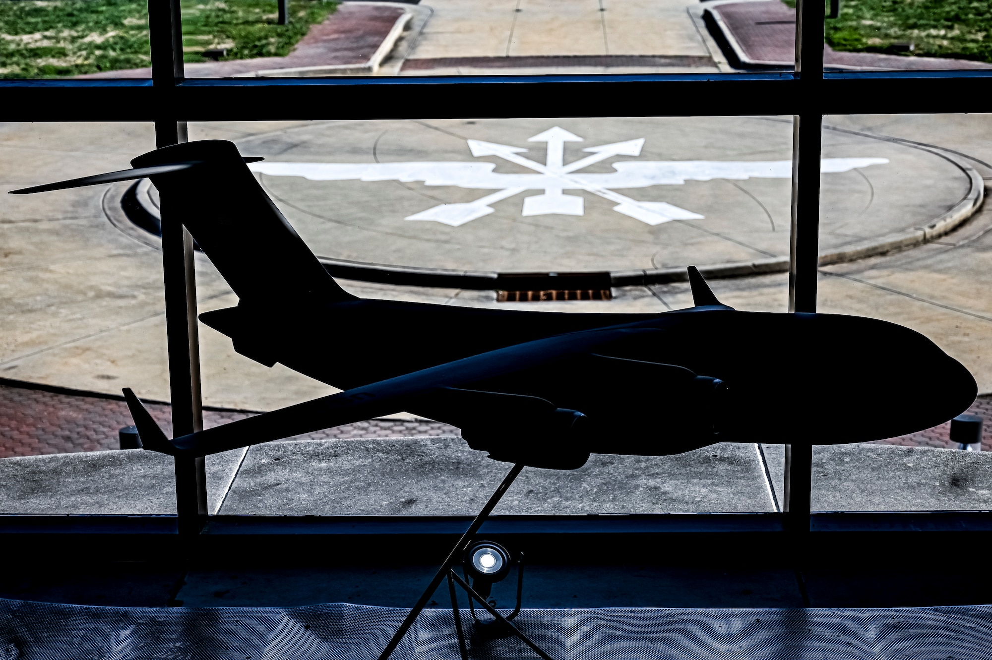 A C-17 Globemaster III model is displayed at the 305th Air Mobility Wing Consolidated Maintenance Operations Facility building prior to the arrival of U.S. Air Force Maj. Gen. Albert Miller, Aircrew Task Force director, at Joint Base McGuire-Dix-Lakehurst, N.J. on Aug. 25, 2022. Miller has amplified community outreach to aircrew members in the field through increased site visits. These visits provide a chance to have meaningful discussions with all aircrew members to capture operational, quality of life, and quality of service concerns to inform policy decisions.