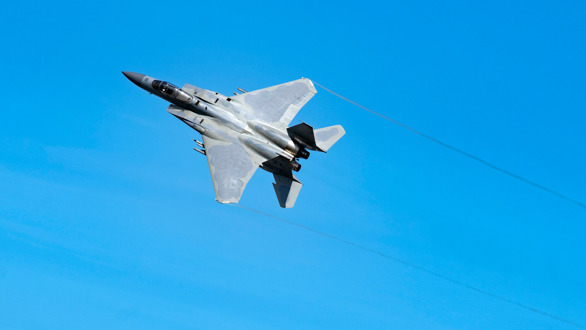 An F-15C Eagle assigned to the 44th Fighter Squadron flies overhead in support of surge operations at Kadena Air Base, Japan, Aug. 23, 2022. Surge operations are a vital component to the development of aircrew and support personnel, allowing them to build and further improve the skills needed to remain a ready and capable force. (U.S. Air Force photo by Senior Airman Jessi Roth)