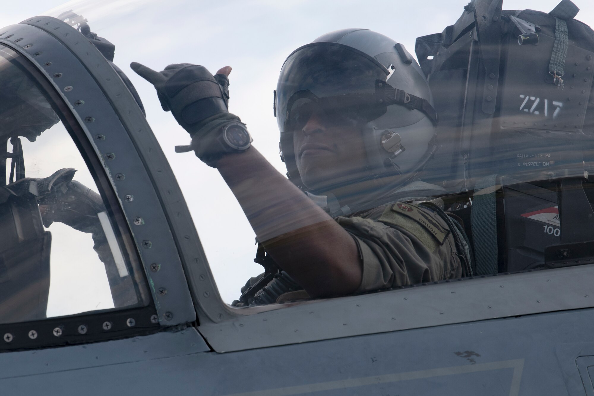 An F-15C Eagle pilot assigned to the 44th Fighter Squadron sits in the cockpit while receiving hot-pit refueling during surge operations at Kadena Air Base, Japan, Aug. 24, 2022. During a hot-pit refuel, the pilot remains in the cockpit with engines running while maintenance crews perform safety checks and refuel the aircraft, cutting the time between sorties to less than 30 minutes. (U.S. Air Force photo by Senior Airman Jessi Roth)
