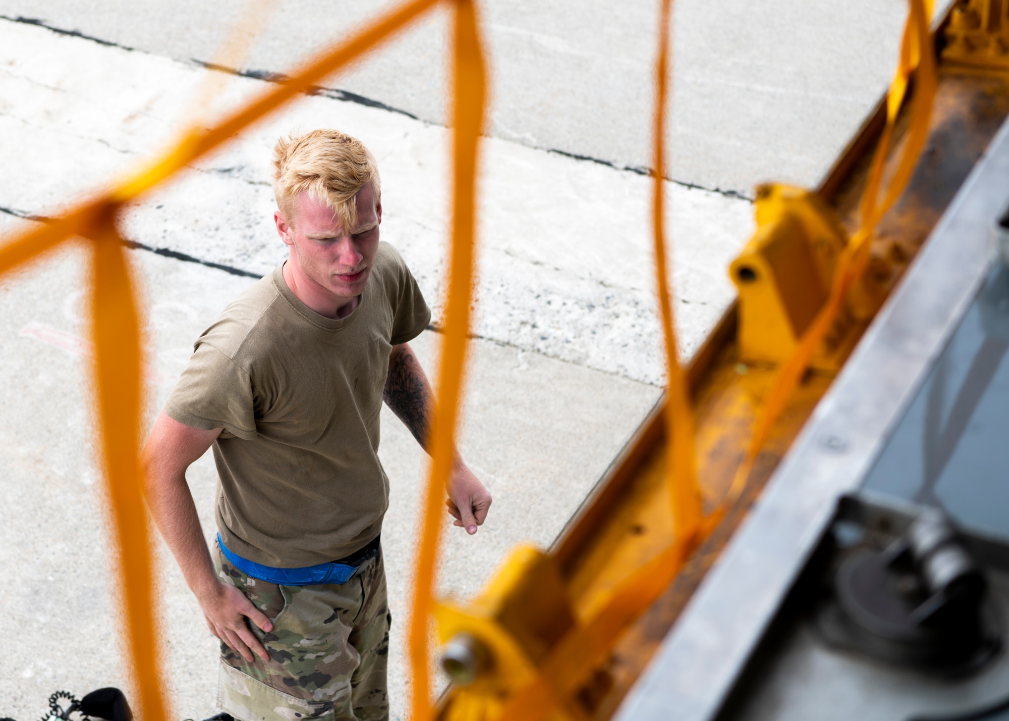 U.S. Air Force Senior Airman Jacob Tobolski, a crew chief assigned to the 6th Aircraft Maintenance Squadron, helps offload baggage from a KC-135 Stratotanker assigned to the 91st Air Refueling Squadron, after arriving at Bangor Air National Guard Base, Maine, Aug. 22, 2022.