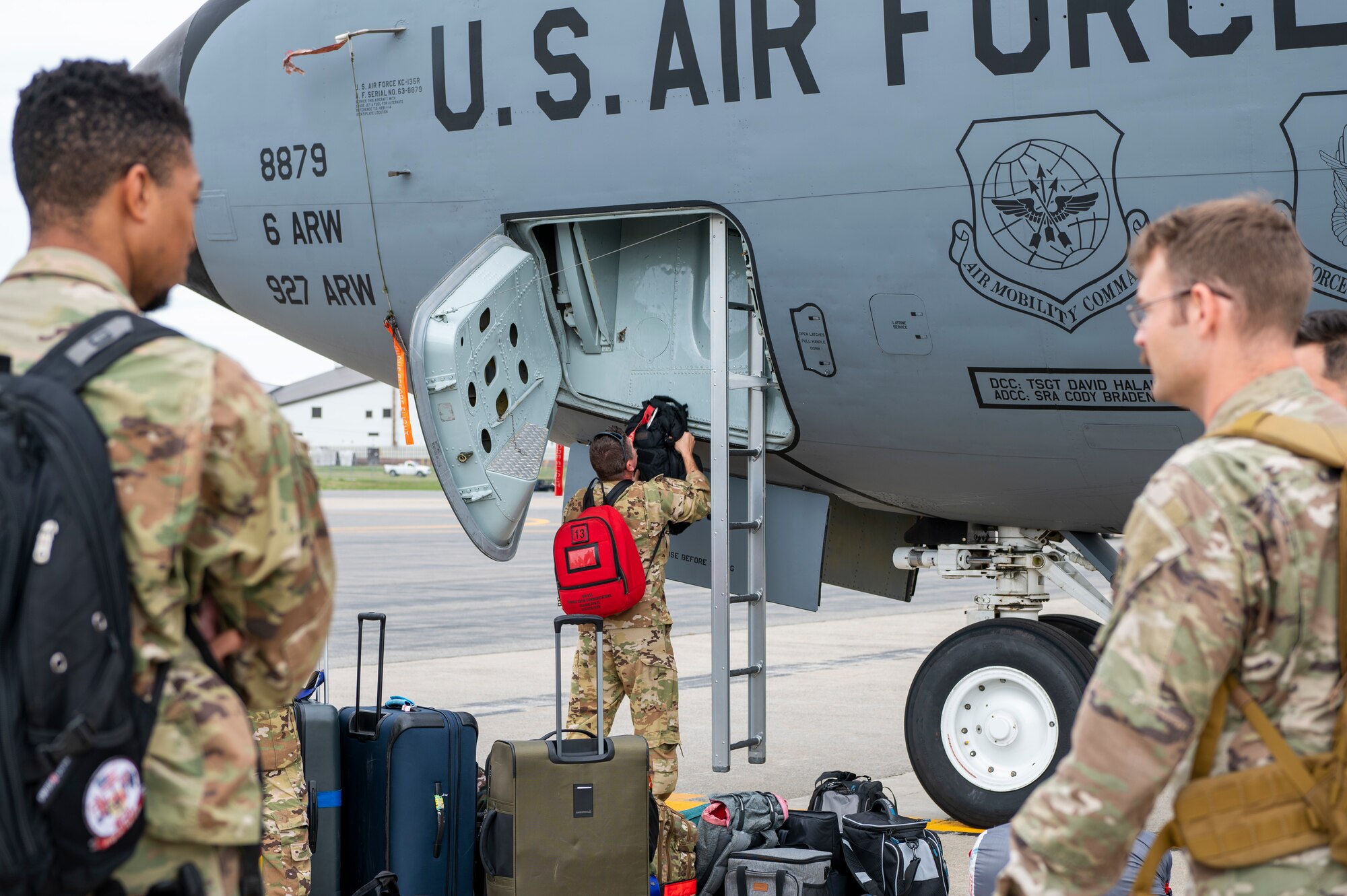 6th Air Refueling Wing Airmen offload baggage from a KC-135 Stratotanker assigned to the 91st Air Refueling Squadron after landing at Bangor Air National Guard Base, Maine, Aug. 22, 2022.