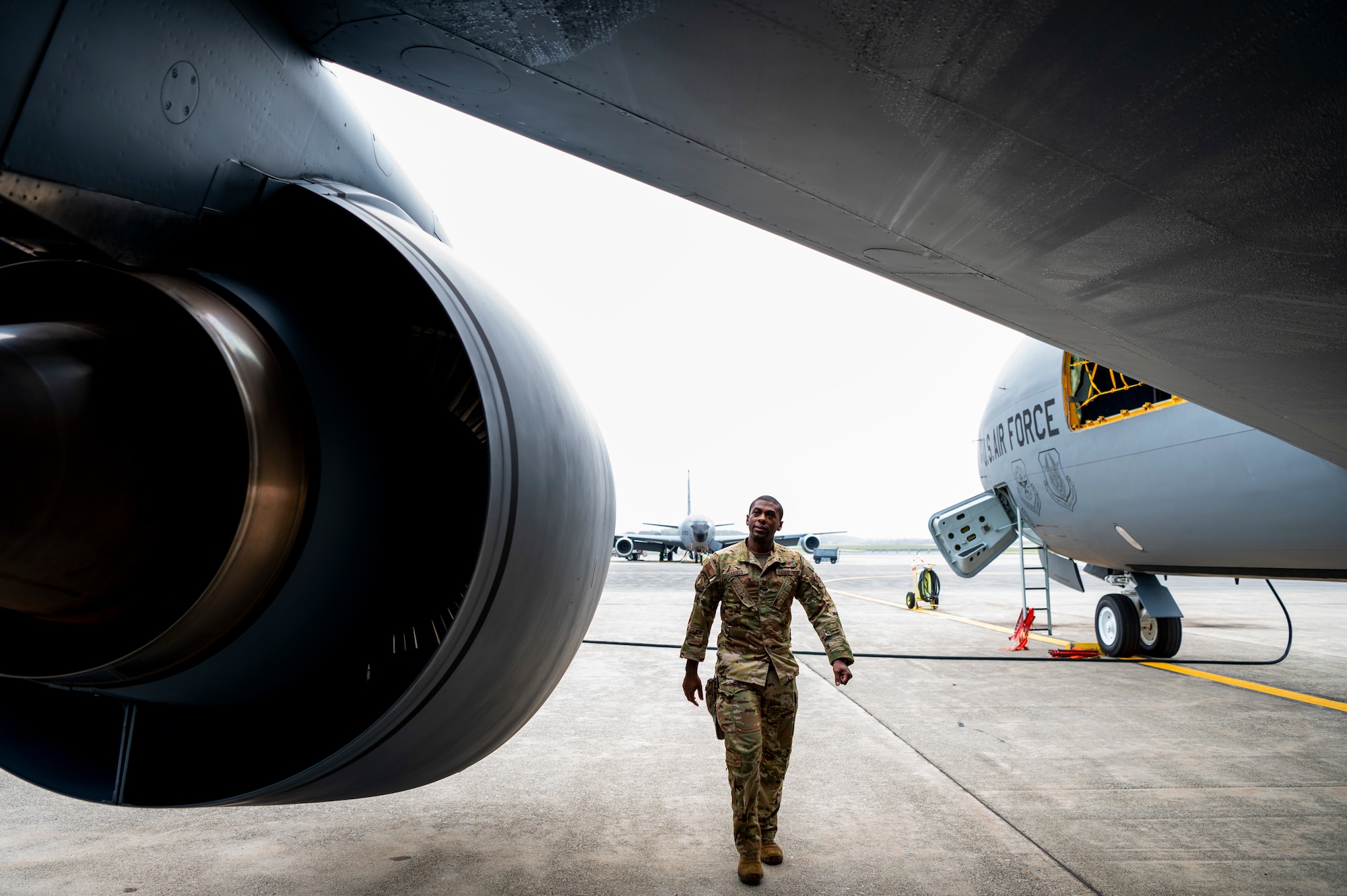 U.S. Air Force Major Christopher Daniels, a pilot assigned to the 91st Air Refueling Squadron inspects a KC-135 Stratotanker before taking off from Bangor Air National Guard Base, Maine, Aug. 24, 2022.