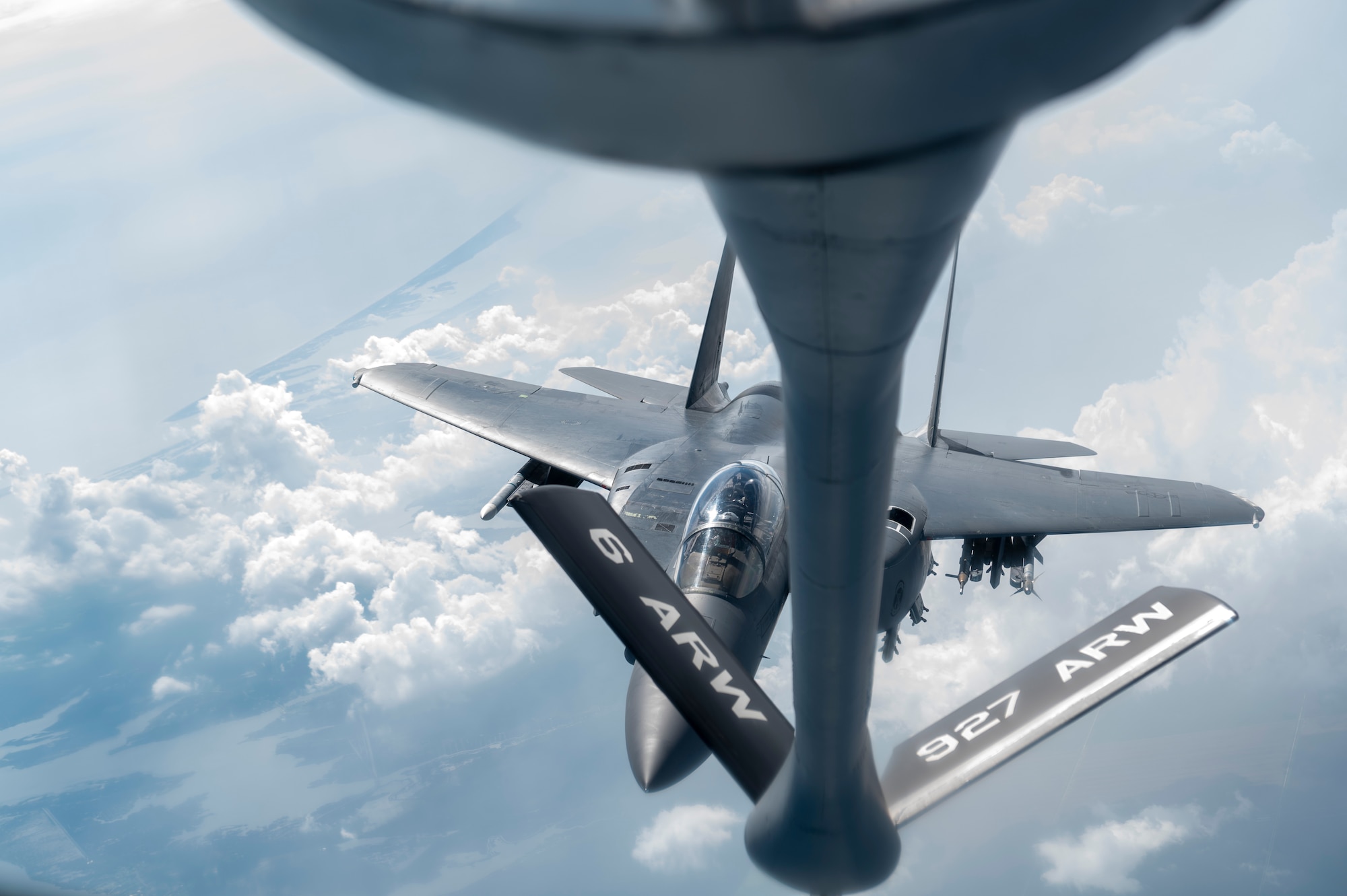 An F-15E Strike Eagle assigned to the 4th Fighter Wing, approaches a KC-135 Stratotanker assigned to the 91st Air Refueling Squadron over the Northeastern U.S. Aug. 24, 2022.