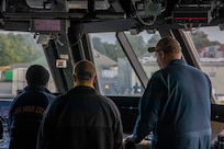 Sailors aboard the Freedom-variant littoral combat ship USS Sioux City (LCS 11) maneuver the ship while pulling in to Fredericia, Denmark for a  scheduled port visit, Aug. 24, 2022. Sioux City is on a scheduled deployment in the U.S. Naval Forces Europe area of operations, employed by U.S. Sixth Fleet, to defend U.S., allied, and partner interests.