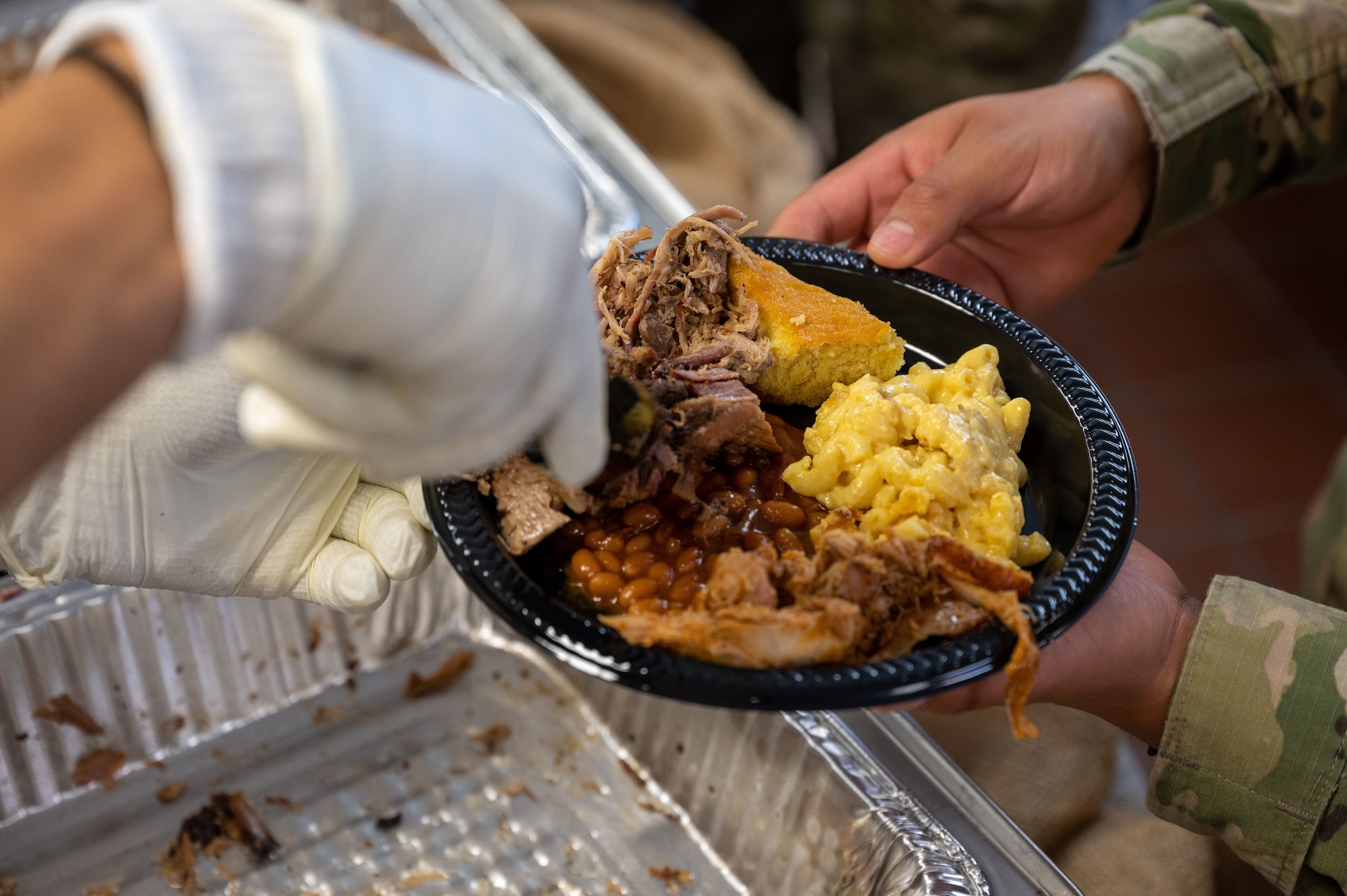 Food is served at the Meet, Greet, Eat with Chef Robert Irvine event on Dover Air Force Base, Delaware, Aug. 25, 2022. More than 75 Airmen attended the event which included a photo opportunity with Irvine and a catered lunch. (U.S. Air Force photo by Senior Airman Cydney Lee)