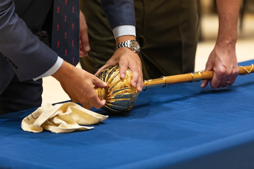 On May 16, 2022, a pair of new maces manufactured by Dalman and Narborough Regimental Mace Company were delivered from Birmingham, England, to the United States Marine Band in Washington, D.C. A small presentation ceremony was held in John Philip Sousa Band Hall at Marine Barracks Washington. Drum Major Master Gunnery Sgt. Duane King, Director Col. Jason K. Fettig and Tommy Dalman each gave remarks, and guests had the chance to examine the maces close up.
