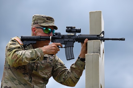 Gen. Daniel Hokanson, chief of the National Guard Bureau, shoots an M4 carbine during weapons qualification at Fort Pickett Maneuver Training Center in Blackstone, Virginia, Aug. 1, 2022.