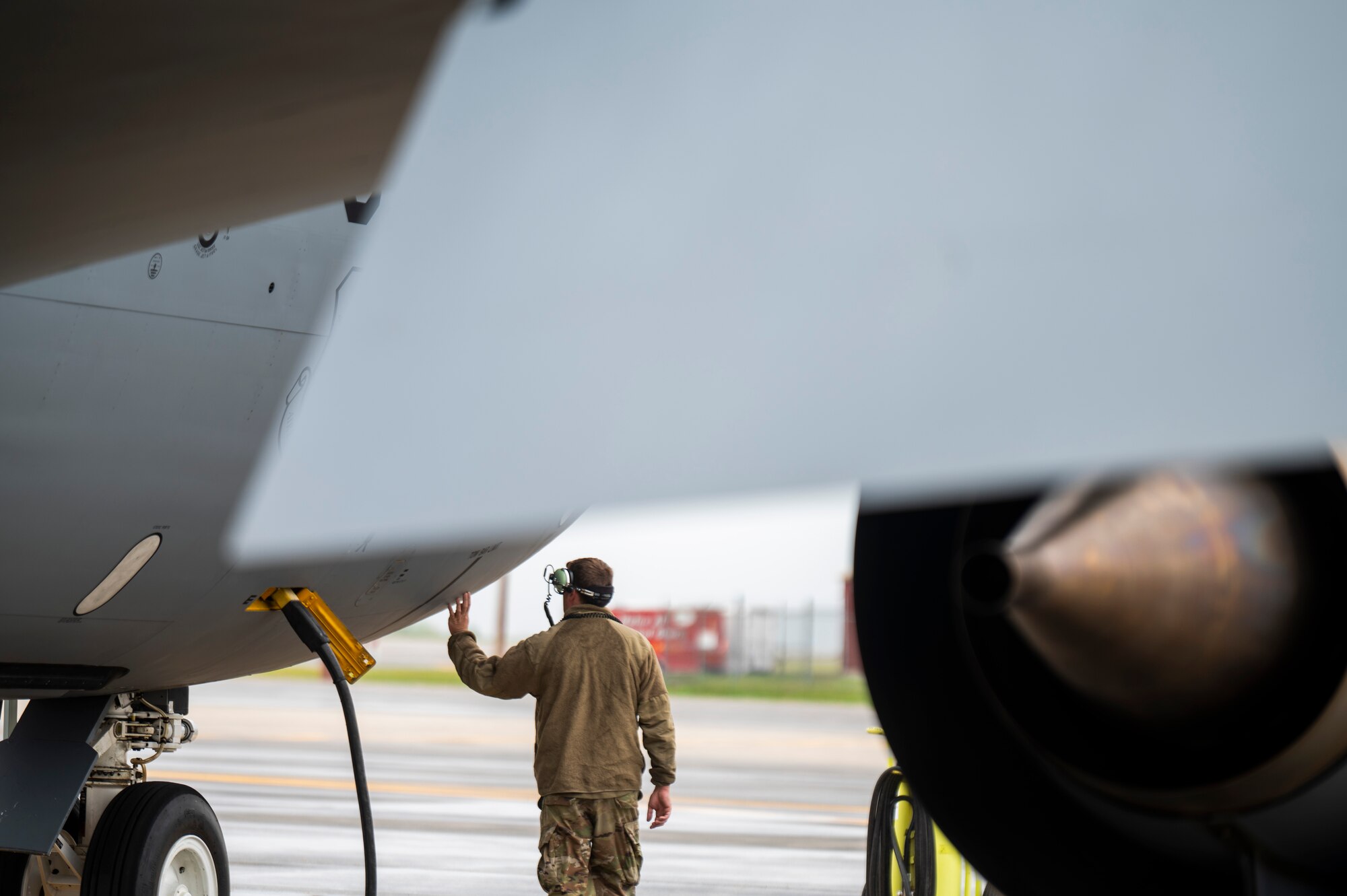 U.S. Air Force Tech Sgt. Joseph Maier, a 6th Aircraft Maintenance Squadron crew chief, prepares a KC-135 Stratotanker assigned to the 91st Air Refueling Squadron for take off at Bangor Air National Guard Base, Maine, Aug. 23, 2022.