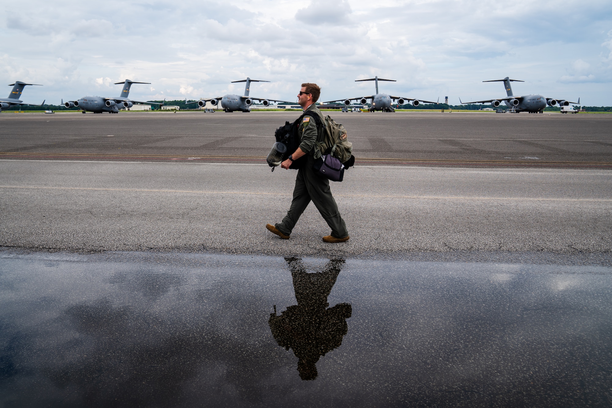 U.S. Air Force Capt. Jaymes Trimbe, 50th Air Refueling Squadron pilot, walks on the flight line during the 6th Air Refueling Wing’s Agile Combat Employment capstone exercise at Joint Base Charleston, South Carolina, Aug. 23, 2022.