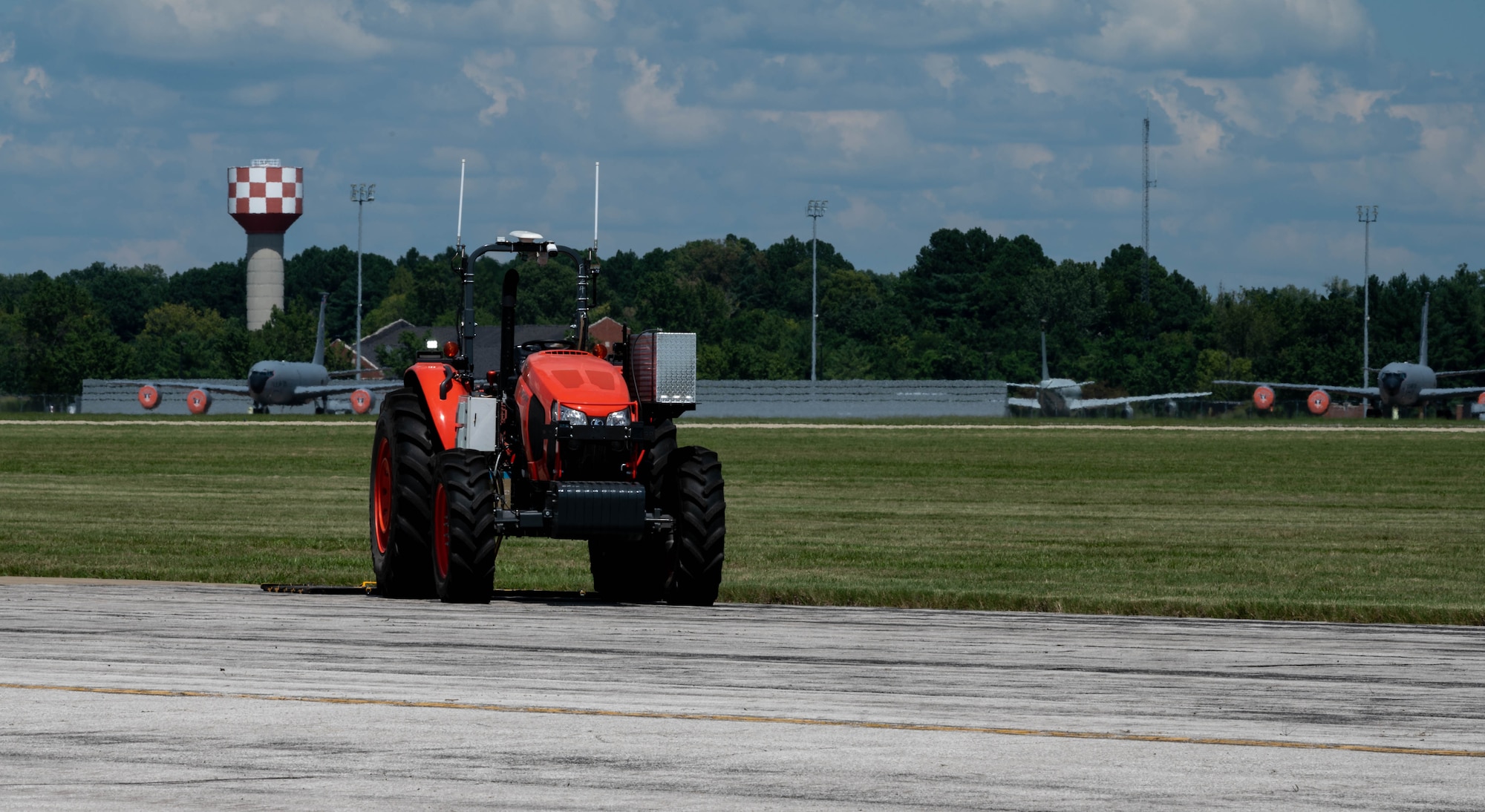tractor moves on flight line