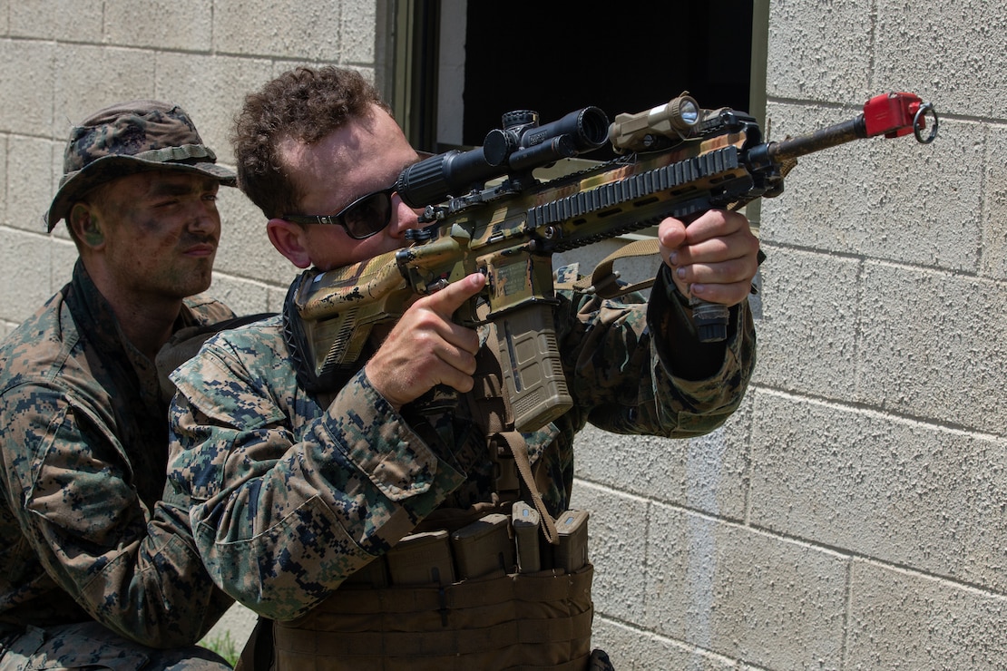U.S. Marines with 1st Battalion, 2d Marine Regiment, 2d Marine Division, post security during a Marine Corps Combat Readiness Evaluation on Camp Lejeune, North Carolina, June 9, 2022. This type of training evolution is a culminating event designed to formally evaluate a unit’s combat readiness operation abilities. (U.S. Marine Corps photo by Cpl. Timothy Fowler)