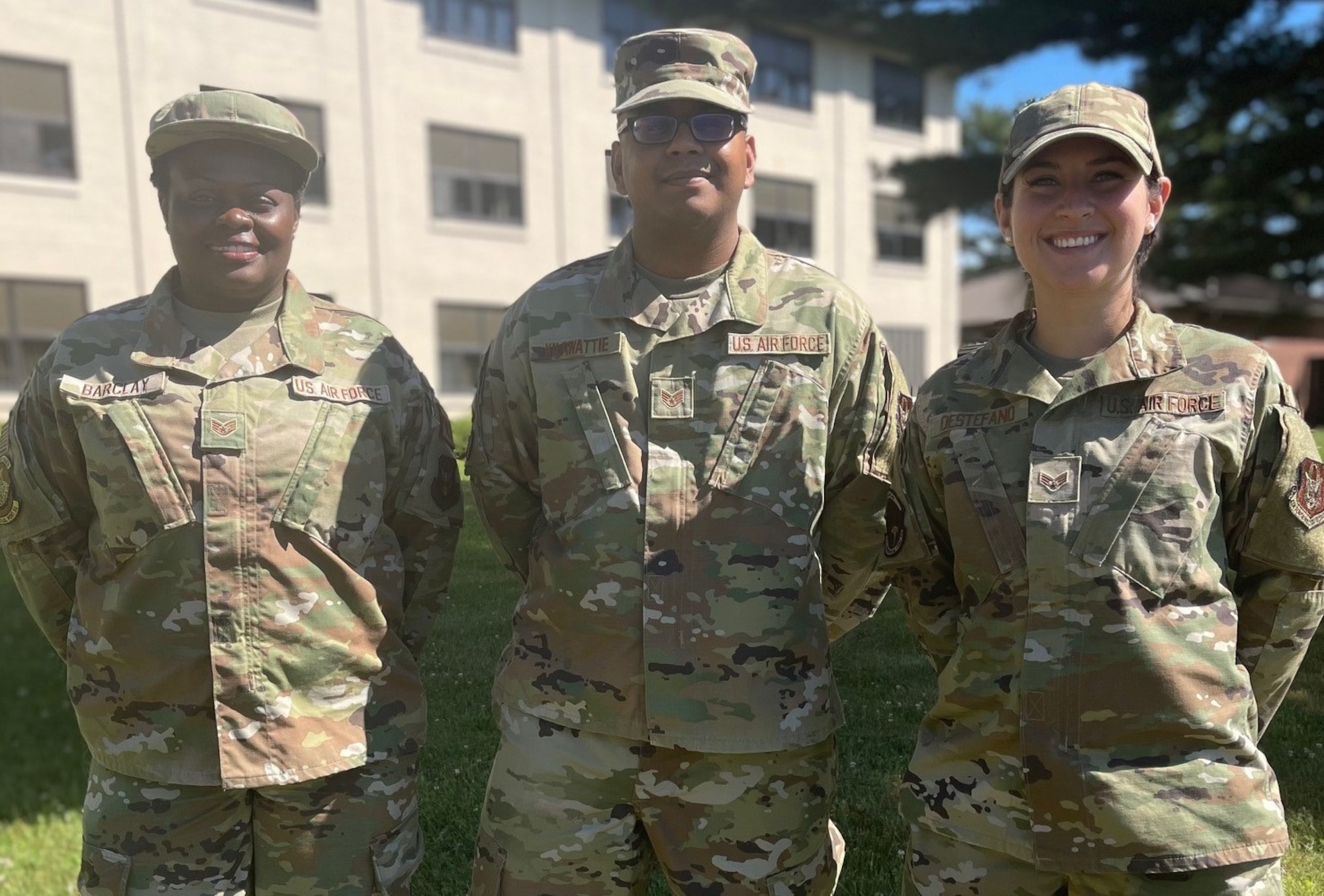 The president of the 514th Air Mobility Wing's Rising Six, Staff Sgt. Steven Kilawattie (center) stands with Rising Six Vice President Staff Sgt. Faith Barclay (left) and Rising Six Secretary Senior Airman April DeStefano.