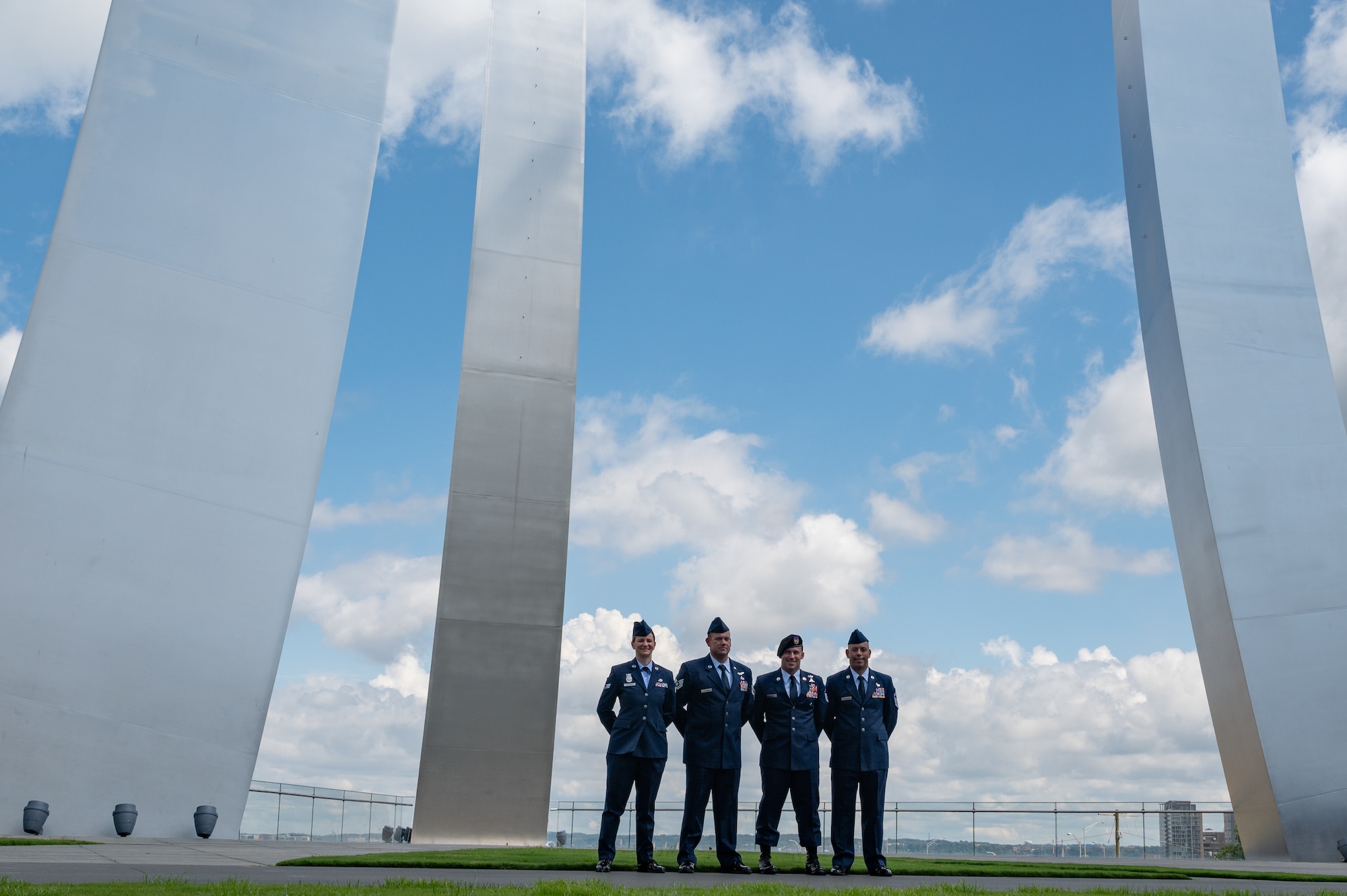 From left: U.S. Air Force Senior Airman Kristina L. Schneider, of the 179th Airlift Wing, Ohio National Guard; Tech Sgt. Brett A. Yoakum, of the 164th Airlift Wing, Tennessee National Guard; Master Sgt. Daniel P. Keller, of the 124th Fighter Wing, Idaho National Guard; and Senior Master Sgt. Jonathan Sotomayor, of the 125th Fighter Squadron, Florida National Guard, pose for a photo at the Air Force Memorial, Arlington, Virginia, on Aug. 22, 2022.