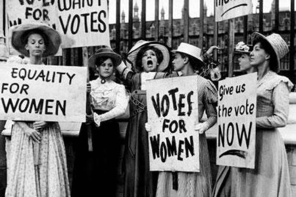 Women demonstrate outside of President Woodrow Wilson's White House for passage of the 19th Amendment giving them the right to vote. National Archives photo