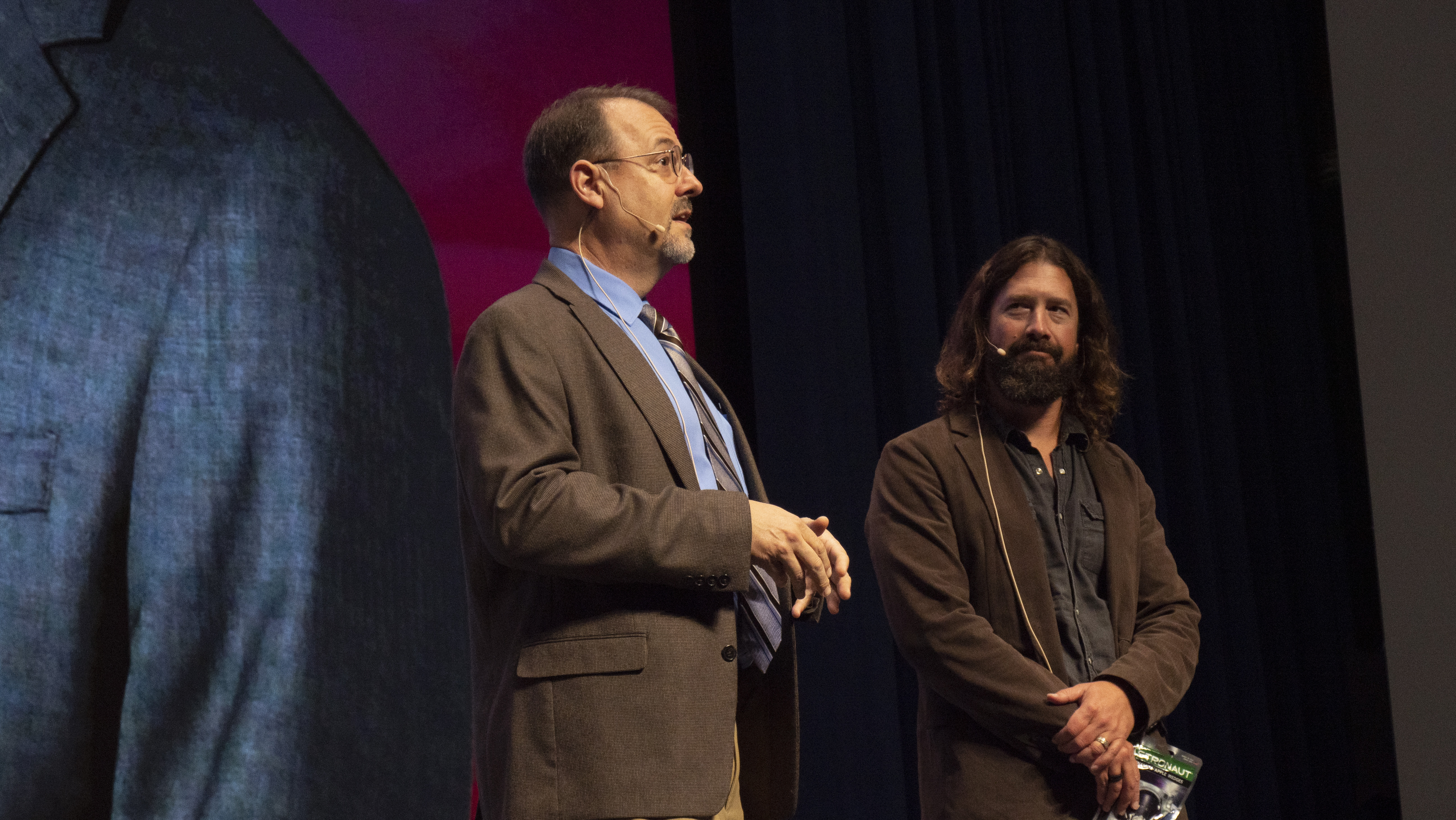 Air Force Research Laboratory historians Jeff Duford, left, and Dr. Darren Raspa, right, host AFRL Inspire in celebration of the U.S. Air Force's 75th anniversary. AFRL held this special TEDx-style event at the Air Force Institute of Technology's Kenney Hall at Wright-Patterson Air Force Base, Aug. 23, 2022. (U.S. Air Force photo / Keith Lewis)