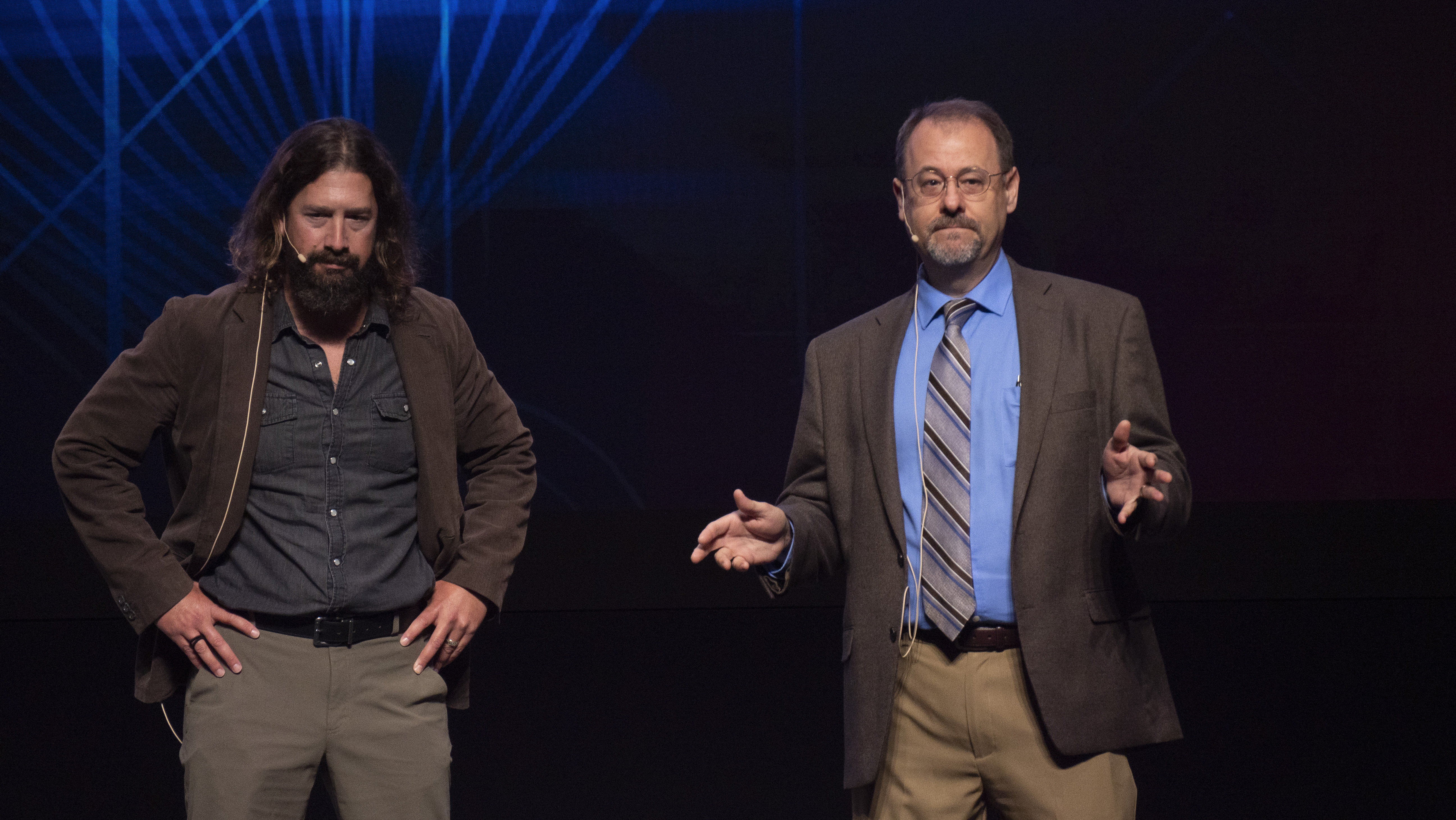 Air Force Research Laboratory historians Dr. Darren Raspa, left, and Jeff Duford, right, host AFRL Inspire in celebration of the U.S. Air Force's 75th anniversary. AFRL held this special TEDx-style event at the Air Force Institute of Technology's Kenney Hall at Wright-Patterson Air Force Base, Aug. 23, 2022. (U.S. Air Force photo / Keith Lewis)