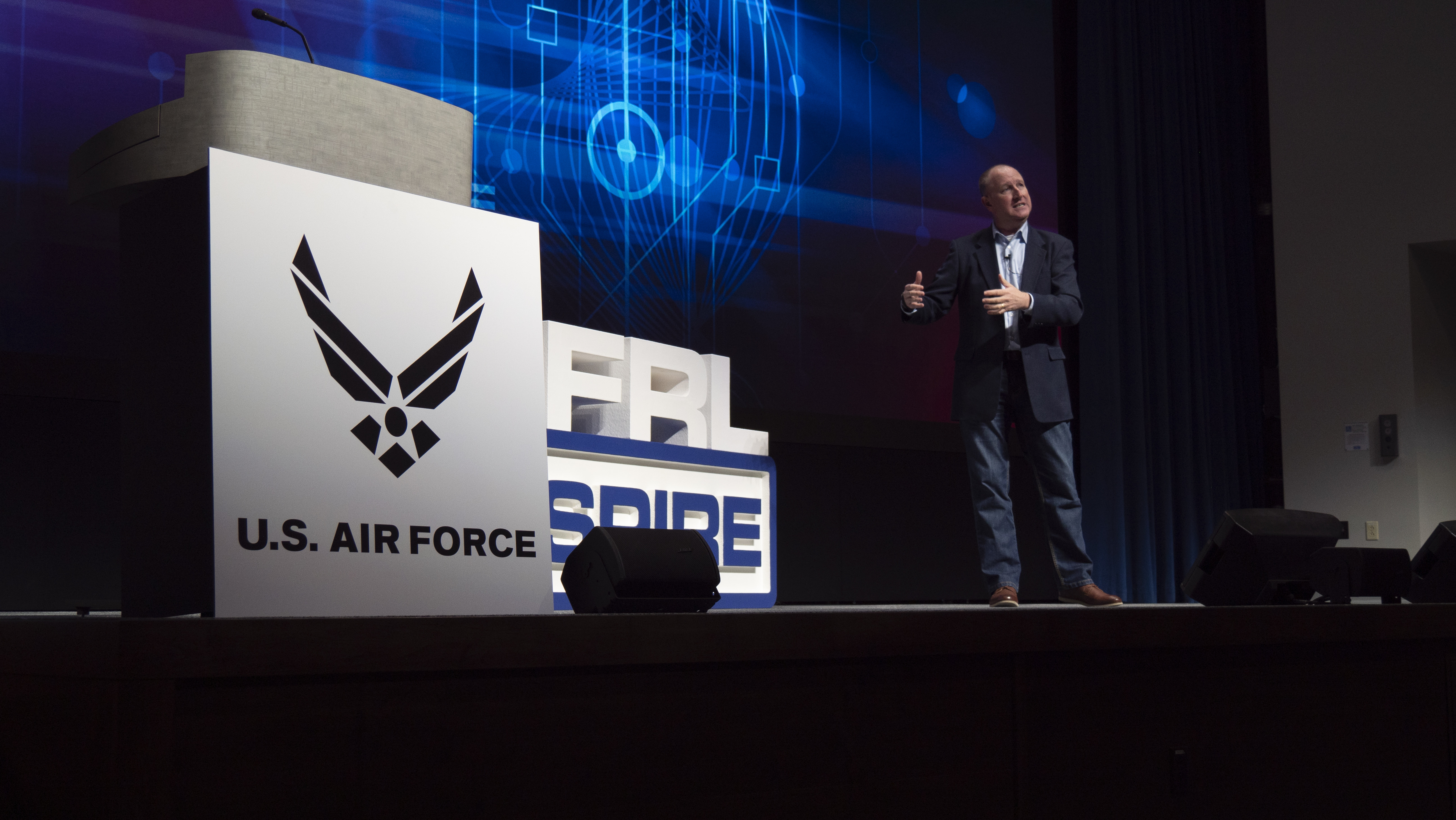Brian “Mitch” Mitchell, a pipeline coordinator from the Air Force Research Laboratory’s  Munitions Directorate at Eglin Air Force Base, Florida, presents his talk titled “Creating the Next Generation of Innovators, Creators and Inventors,” during AFRL Inspire. AFRL hosted this special TEDx-style event at the Air Force Institute of Technology's Kenney Hall at Wright-Patterson Air Force Base, Aug. 23, 2022. (U.S. Air Force photo / Keith Lewis)