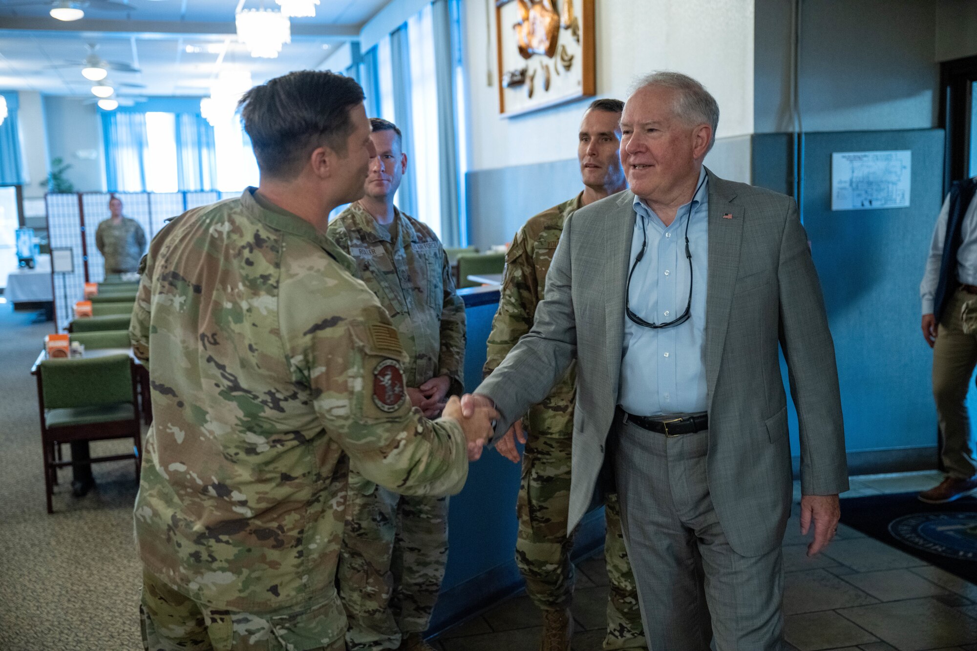 Secretary of the Air Force Frank Kendall visits with Maj. John Lupo, 647th Force Support Squadron commander during a tour of the Hale Aina Dining Facility at Joint Base Pearl Harbor-Hickam, Hawaii, Aug. 18, 2022. Kendall spoke with Airmen and Guardians about Hickam’s unique mission sets and how it operates with regional partners to advance mission capabilities in the Indo-Pacific region. (U.S. Air Force photos by Senior Airman Makensie Cooper)