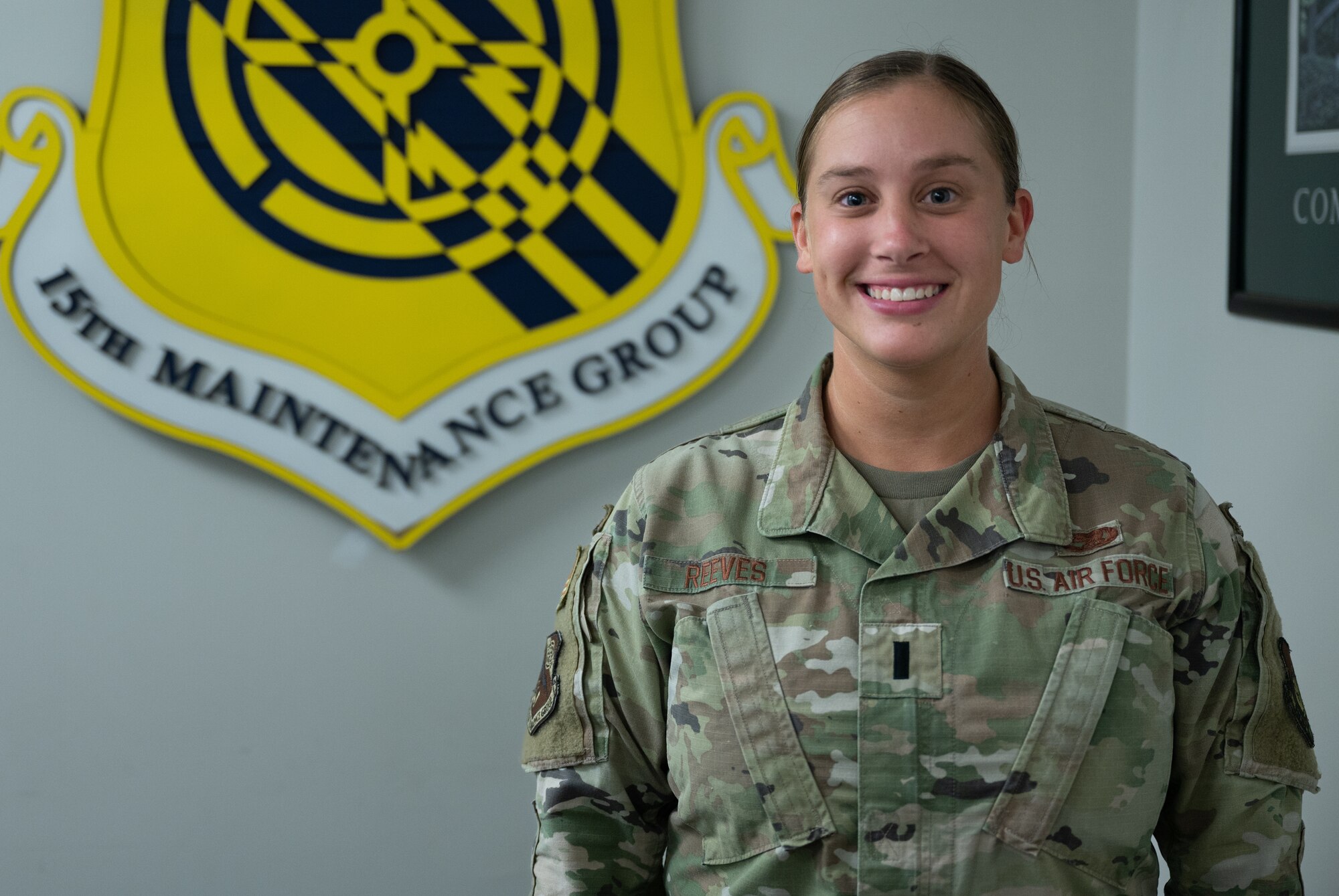 1st Lt. Bethany Reeves, 15th Maintenance Operations director of operations, poses for a photo at Joint Base Pearl Harbor-Hickam, Hawaii, Aug. 23, 2022. Reeves joined the Air Force in 2019 and is now working with scheduling analysis, unit deployment managers, quality assurance and maintenance training managers. (U.S. Air Force photo by Staff Sgt. Alan Ricker)
