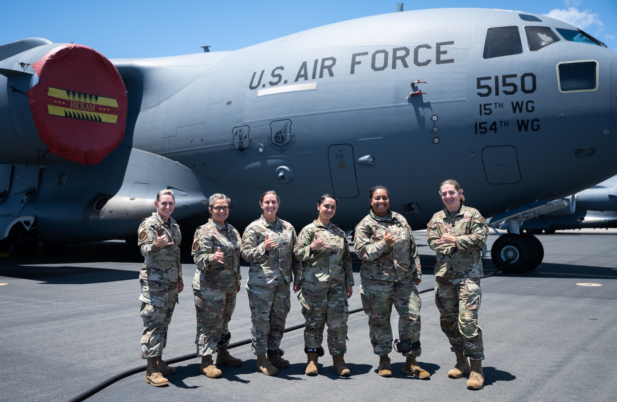 Leadership from the 15th Maintenance Squadron, 15th Aircraft Maintenance Squadron and 15th Maintenance Operations pose for a photo in front of a C-17 Globemaster III at Joint Base Pearl Harbor-Hickam, Hawaii, Aug. 24, 2022. The leadership pictured consists of three directors of operations and three production superintendents. (U.S. Air Force photo by Staff Sgt. Alan Ricker)