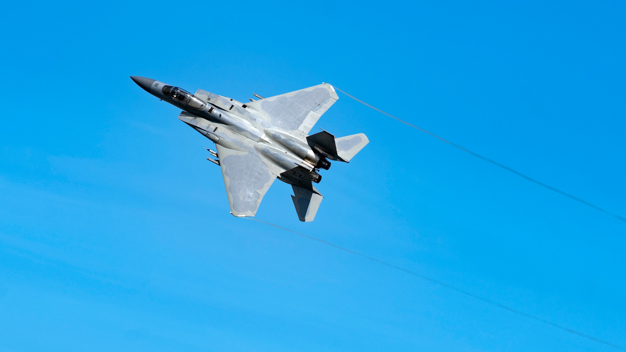 An F-15C Eagle assigned to the 44th Fighter Squadron flies overhead in support of surge operations at Kadena Air Base, Japan, Aug. 23, 2022. Surge operations are a vital component to the development of aircrew and support personnel, allowing them to build and further improve the skills needed to remain a ready and capable force. (U.S. Air Force photo by Senior Airman Jessi Roth)