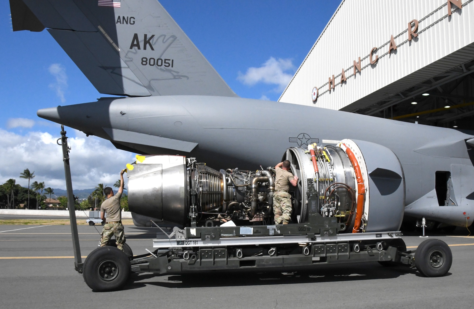 U.S. Air Force Airmen assigned to the 735th Air Mobility Squadron and the 15th Maintenance Group prepare a C-17 Globemaster III engine for installation at Joint Base Pearl Harbor-Hickam, Hawaii on Aug. 19, 2022. (U.S. Air Force photo by  Amelia Dickson)