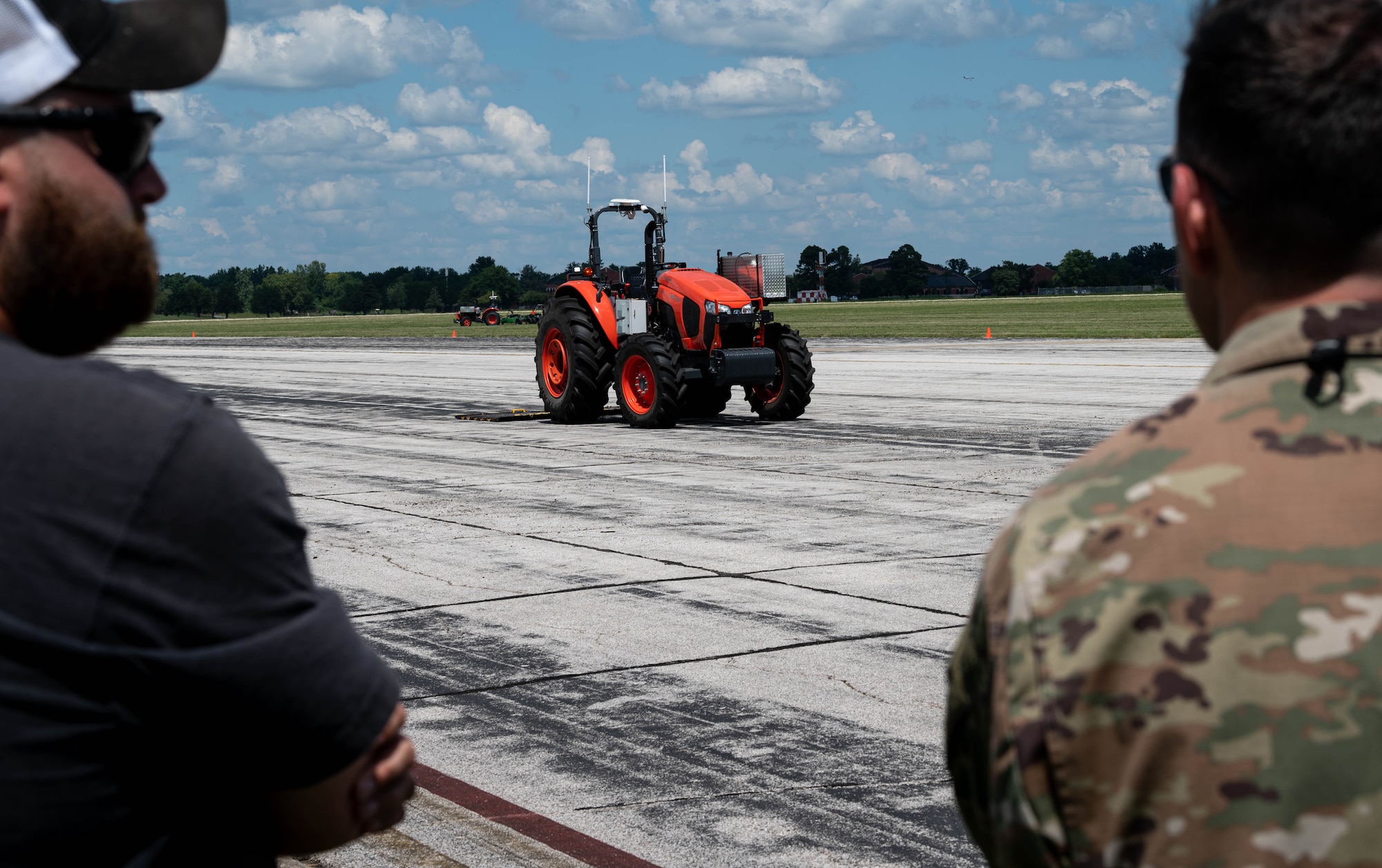 tractor moves on flight line