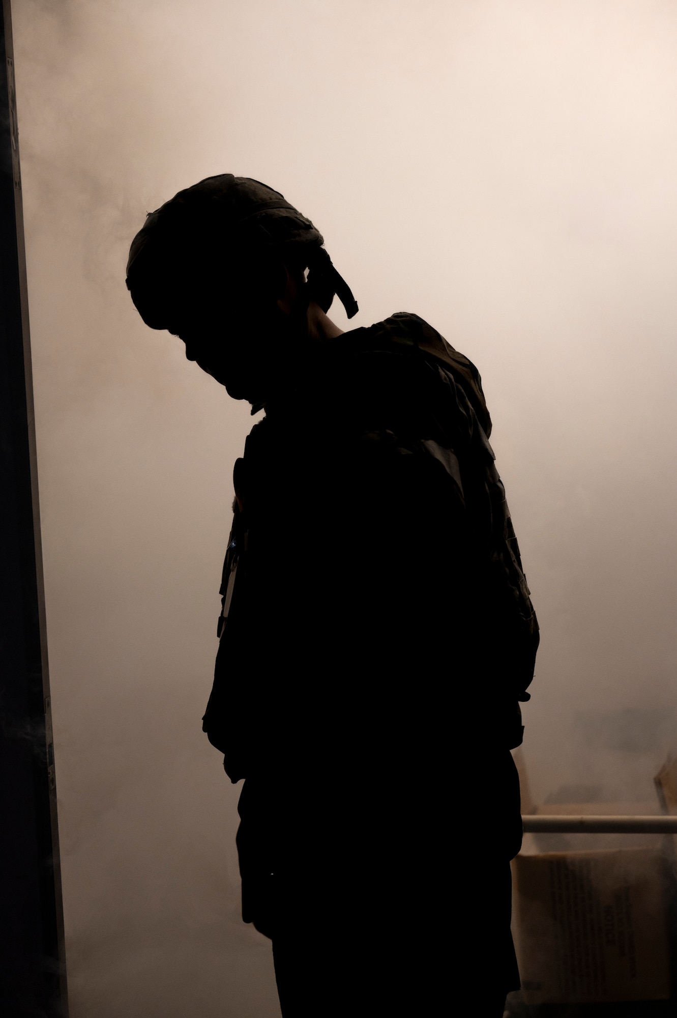 A Wing Inspection team (WIT) member with the 51st Civil Engineer Squadron prepares a room with smoke for a simulated fire during a training event at Osan Air Base, Republic of Korea, Aug. 16, 2022.