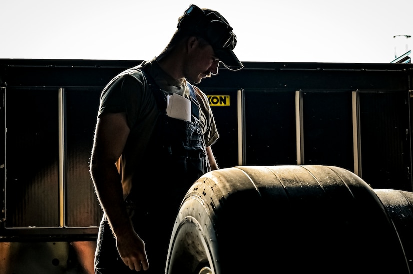 U.S. Air Force Senior Airman Colton Corder, 305th Maintenance Squadron crew chief, performs a wheel inspection at Joint Base McGuire-Dix-Lakehurst, N.J. on Aug. 26, 2022. Crew Chiefs in the Wheel and Tire Section of 305 MXS are validating their local ability to breakdown and build-up tire assemblies for the KC-46's main landing gear and nose landing gear. At the beginning of August 2022, the Air Force Life Cycle Management Center authorized Main Operating Bases to stand up organic tire change capability. A four member team consisting of Crew Chiefs, Sheet Metal, and Nondestructive Inspection went to Altus Air Force Base for initial training and familiarization. By validating local ability to breakdown and build-up tire assemblies for the KC-46, the 305th MXS brings a new capability to JB MDL and will be able to improve support for the KC-46 throughout the Air Force. (U.S. Air Force photo by Senior Airman Matt Porter)