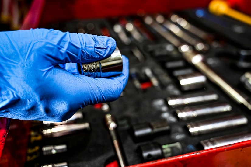 U.S. Air Force Senior Airman Colton Corder, 305th Maintenance Squadron crew chief, performs wheel maintenance at Joint Base McGuire-Dix-Lakehurst, N.J. on Aug. 26, 2022. Crew Chiefs in the Wheel and Tire Section of 305 MXS are validating their local ability to breakdown and build-up tire assemblies for the KC-46's main landing gear and nose landing gear. At the beginning of August 2022, the Air Force Life Cycle Management Center authorized Main Operating Bases to stand up organic tire change capability. A four member team consisting of Crew Chiefs, Sheet Metal, and Nondestructive Inspection went to Altus Air Force Base for initial training and familiarization. By validating local ability to breakdown and build-up tire assemblies for the KC-46, the 305th MXS brings a new capability to JB MDL and will be able to improve support for the KC-46 throughout the Air Force. (U.S. Air Force photo by Senior Airman Matt Porter)