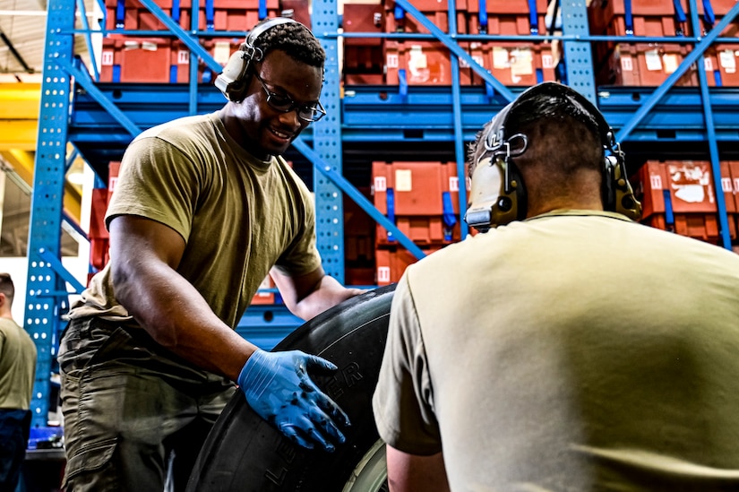 U.S. Air Force Senior Airman Rodney Alston III, 305th Maintenance Squadron crew chief, performs a wheel inspection at Joint Base McGuire-Dix-Lakehurst, N.J. on Aug. 26, 2022. Crew Chiefs in the Wheel and Tire Section of 305 MXS are validating their local ability to breakdown and build-up tire assemblies for the KC-46's main landing gear and nose landing gear. At the beginning of August 2022, the Air Force Life Cycle Management Center authorized Main Operating Bases to stand up organic tire change capability. A four member team consisting of Crew Chiefs, Sheet Metal, and Nondestructive Inspection went to Altus Air Force Base for initial training and familiarization. By validating local ability to breakdown and build-up tire assemblies for the KC-46, the 305th MXS brings a new capability to JB MDL and will be able to improve support for the KC-46 throughout the Air Force. (U.S. Air Force photo by Senior Airman Matt Porter)